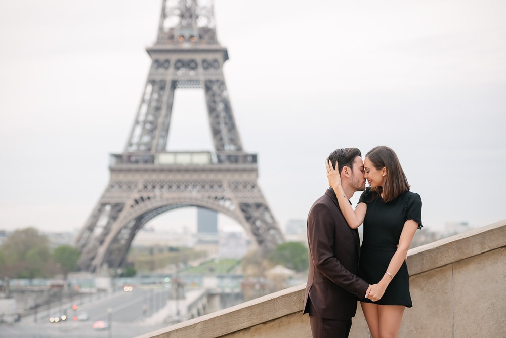couples portrait ideas - girl wrapping her right hand around her fiancés right cheek