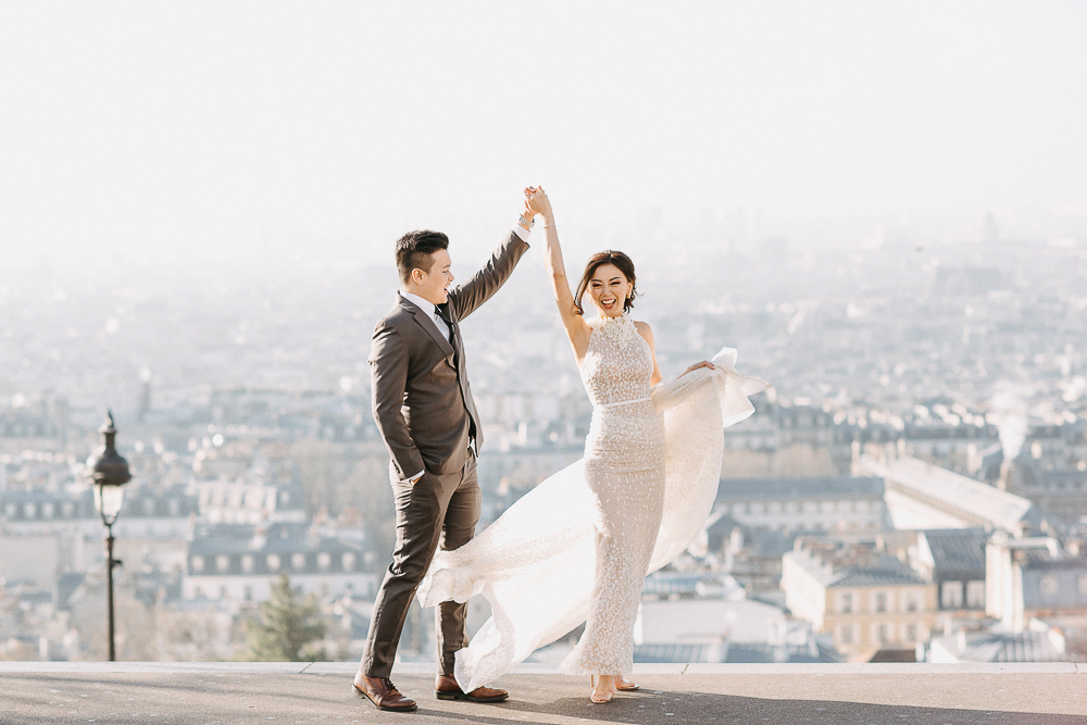Happy pre wedding dancing photo in Montmartre Paris France by Odrida