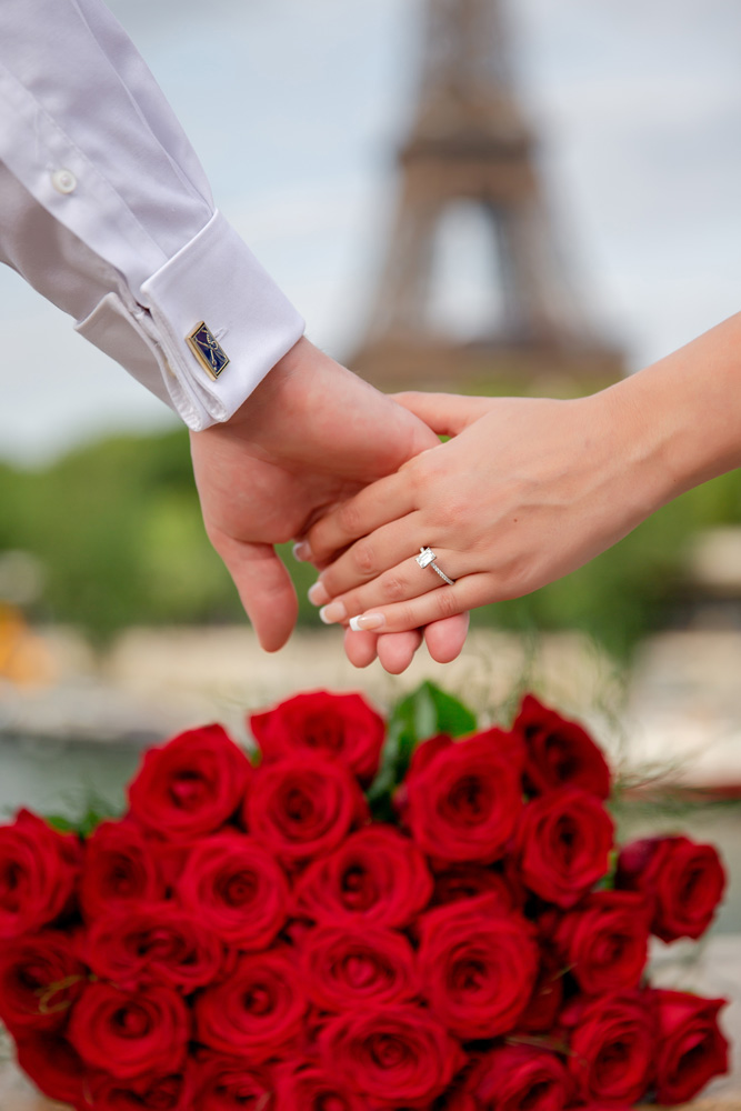 hand in hand with roses and Eiffel Tower